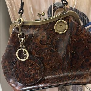 Patricia Nash Laurena leather framed bag in an abstract of animal print